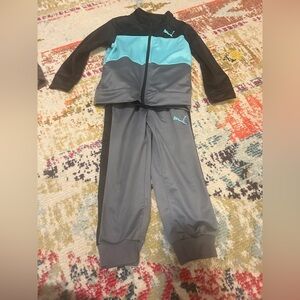 Puma track suit size 4